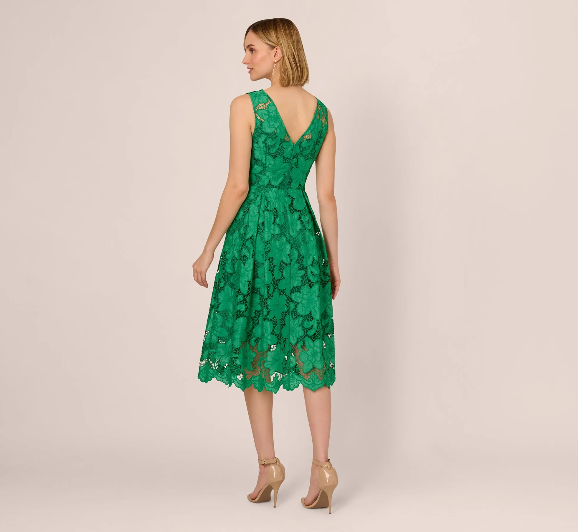 Lace Sleeveless Midi Dress With Sheer Neck And Hem In Green