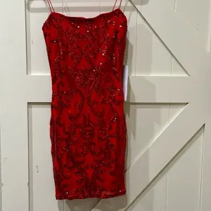 NWT Formal sequin dress. Pit is 16” &amp; stretches to 18”. Length is 34 1/2” medium