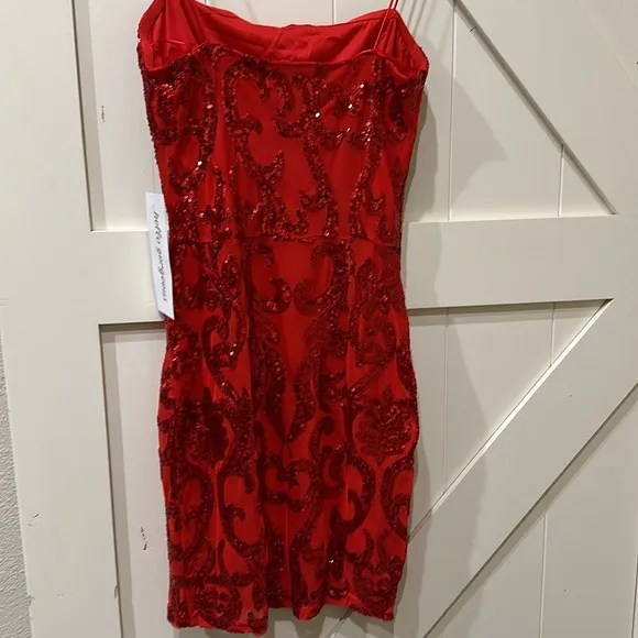 NWT Formal sequin dress. Pit is 16” &amp; stretches to 18”. Length is 34 1/2” medium