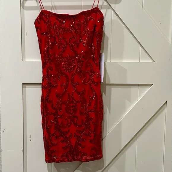 NWT Formal sequin dress. Pit is 16” &amp; stretches to 18”. Length is 34 1/2” medium
