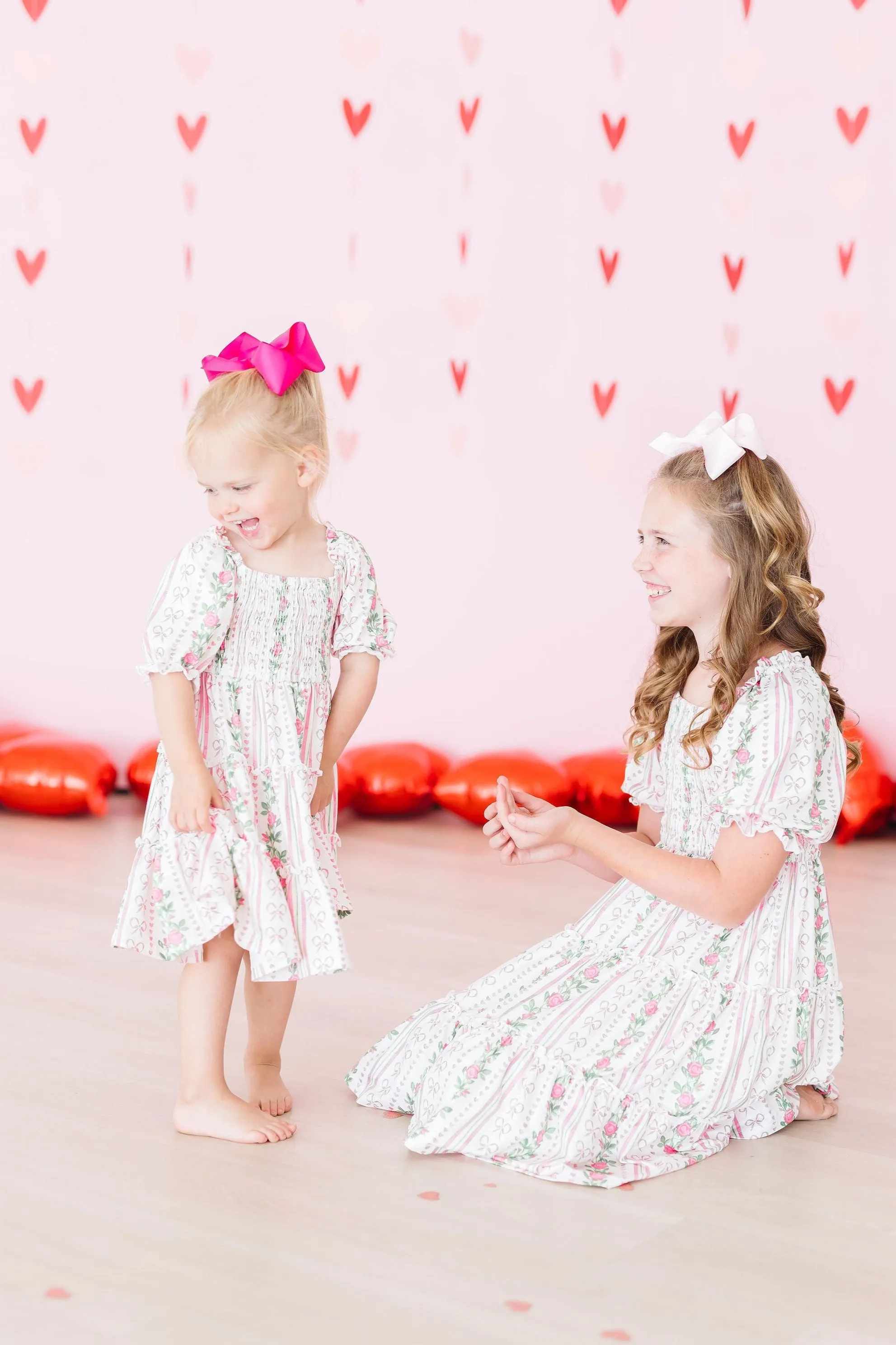 Rosebud Bows Smocked Ruffle Dress