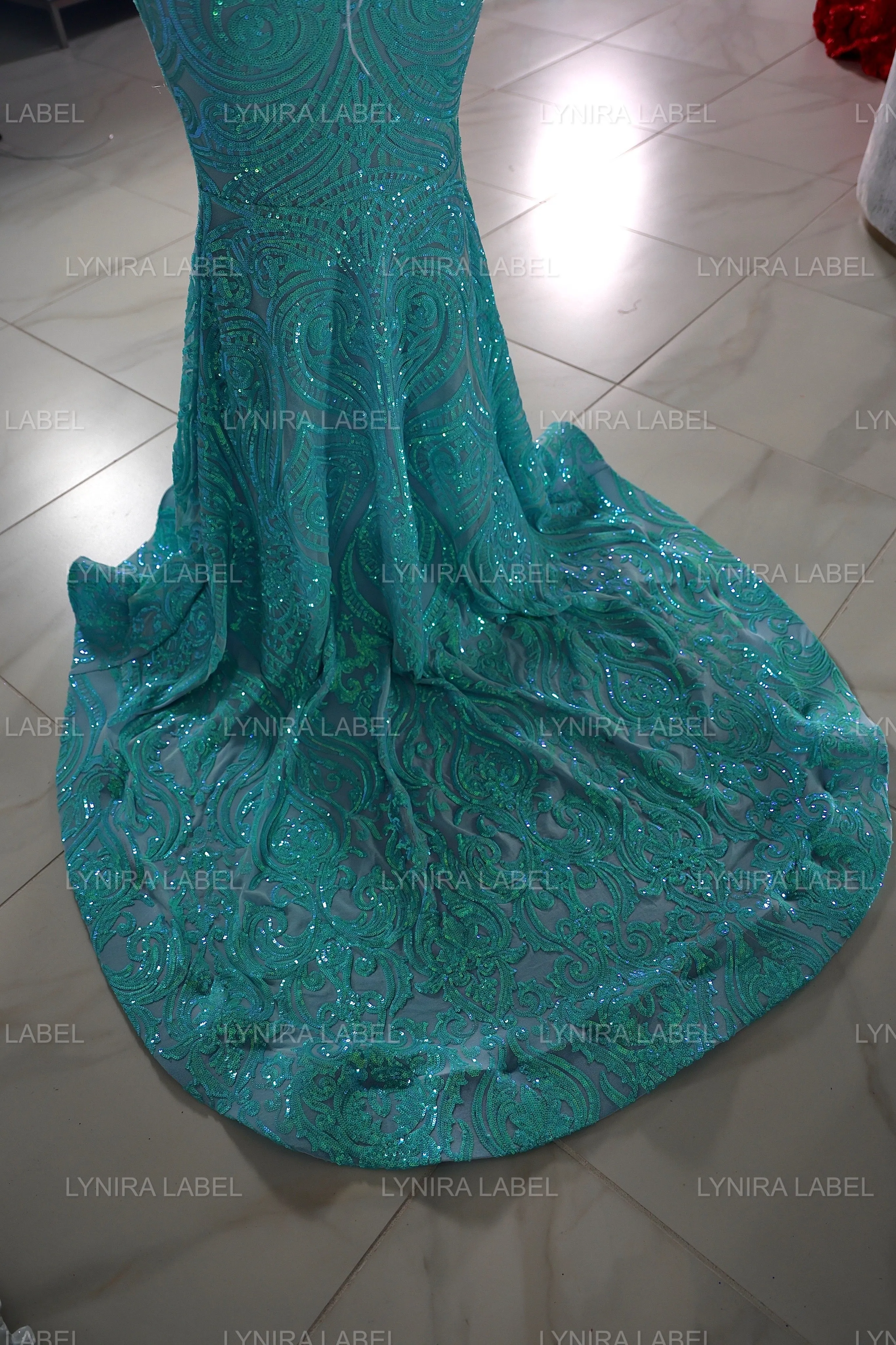 The AALIYAH Sequin Gown